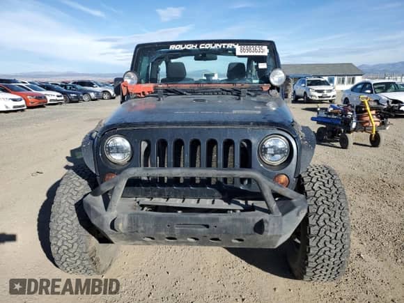 2012 Jeep Wrangler Sport z VIN 1C4AJWAG3CL258130, wystawiony jako Copart lot #86983635 z przebiegiem 154 996 mil mil oraz Czysty tytuł • Clean title. Historia ofert i sprzedaży dostępna na DreamBid. Obrazek 5.