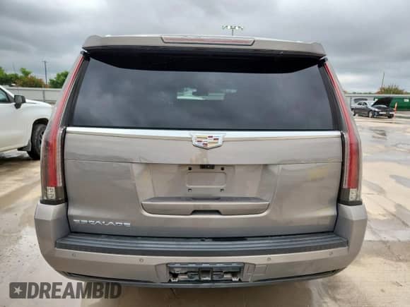 2018 Cadillac Escalade Premium Luxury with VIN 1GYS4CKJ9JR191879, listed as a Copart auction lot 64717525 with 139,616 mi miles and Clean title. Bid and sale history available at DreamBid. Image 6.