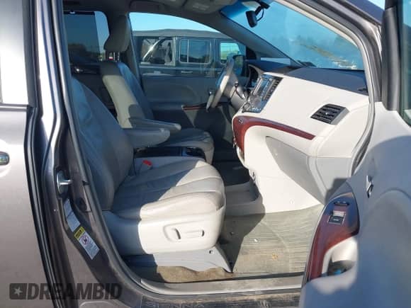 2012 Toyota Sienna XLE with VIN 5TDDK3DC5CS030615, listed as a IAAI auction lot 43358740 with 151,165 mi miles and . Bid and sale history available at DreamBid. Image 5.