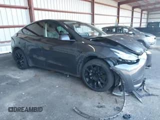 2022 Tesla Model Y Long Range z VIN 7SAYGDEE9NA010903, wystawiony jako IAAI lot #43397965 z przebiegiem 20 830 mil mil oraz . Historia ofert i sprzedaży dostępna na DreamBid. Obrazek 1.