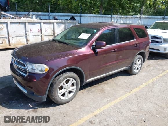 2012 Dodge Durango Crew with VIN 1C4RDJDG1CC153000, listed as a IAAI auction lot 43136614 with 186,788 mi miles and . Bid and sale history available at DreamBid. Image 2.