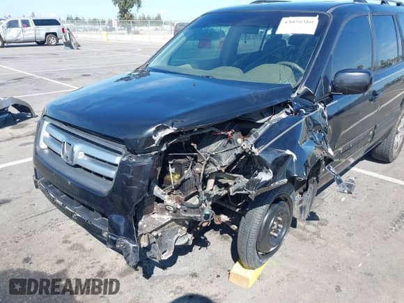 2006 Honda Pilot EX-L z VIN 5FNYF28506B016626, wystawiony jako IAAI lot #43056380 z przebiegiem 284 203 mil mil oraz . Historia ofert i sprzedaży dostępna na DreamBid. Obrazek 6.