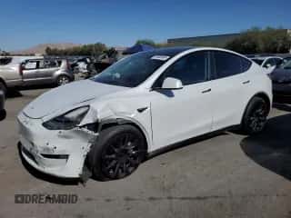 2021 Tesla Model Y Performance with VIN 5YJYGAED6MF181502, listed as a Copart auction lot 58582634 with 33,772 mi miles and Salvage title. Bid and sale history available at DreamBid. Image 1.