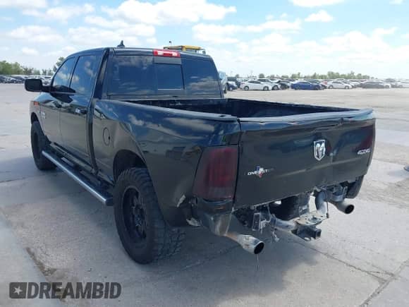 2015 Ram 1500 Big Horn with VIN 1C6RR7TT7FS509101, listed as a IAAI auction lot 43273233 with 206,454 mi miles and . Bid and sale history available at DreamBid. Image 3.