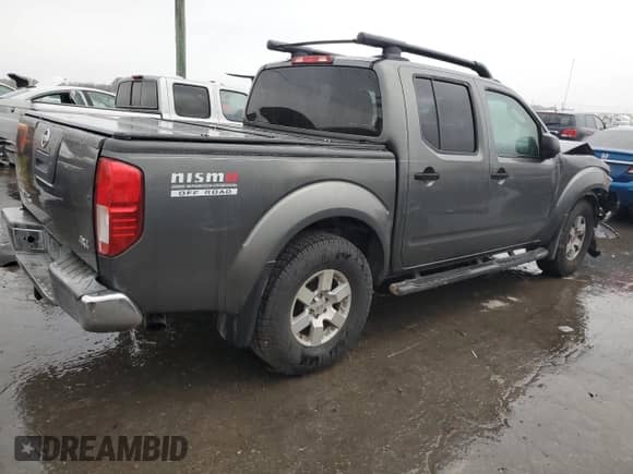 2005 Nissan Frontier Nismo with VIN 1N6AD07W15C435373, listed as a Copart auction lot 78872524 with 209,873 mi miles and Clean title. Bid and sale history available at DreamBid. Image 3.