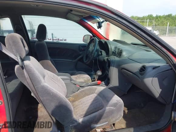 1999 Pontiac Grand Am GT z VIN 1G2NW12E4XM755047, wystawiony jako IAAI lot #42444969 z przebiegiem 242 591 mil mil oraz . Historia ofert i sprzedaży dostępna na DreamBid. Obrazek 5.