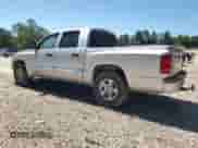 2007 Dodge Dakota SLT z VIN 1D7HE48P67S218445, wystawiony jako Copart lot #61587285 z przebiegiem 173 377 mil mil oraz Czysty tytuł • Clean title. Historia ofert i sprzedaży dostępna na DreamBid. Obrazek 2.