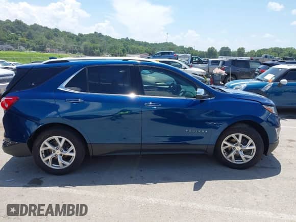 2020 Chevrolet Equinox Premier with VIN 2GNAXXEV3L6185614, listed as a IAAI auction lot 42798631 with 80,929 mi miles and . Bid and sale history available at DreamBid. Image 13.