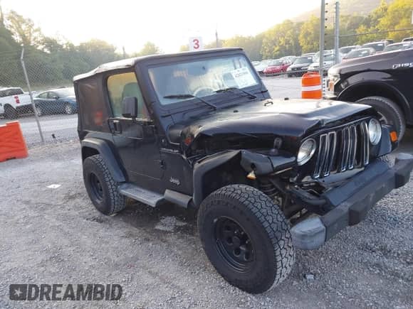 2001 Jeep Wrangler SE with VIN 1J4FA29P01P350847, listed as a IAAI auction lot 42821806 with 205,522 mi miles and . Bid and sale history available at DreamBid. Image 1.