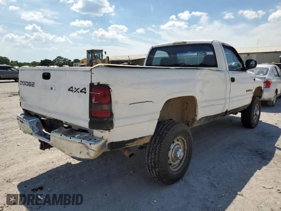 2001 Dodge 2500 с VIN 3B7KF26Z41M561258, выставлен на аукционе Copart как лот 60939814 с пробегом 220 477 миль миль и Чистый • Clean title. История ставок и продаж доступна на DreamBid. Изображение 3.