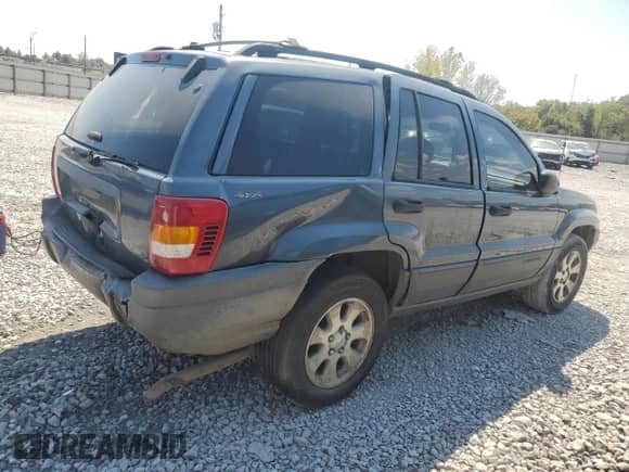 2001 Jeep Grand Cherokee Laredo с VIN 1J4GW48S21C693190, выставлен на аукционе Copart как лот 80888225 с пробегом 428 569 миль миль и Списание • Salvage title. История ставок и продаж доступна на DreamBid. Изображение 3.