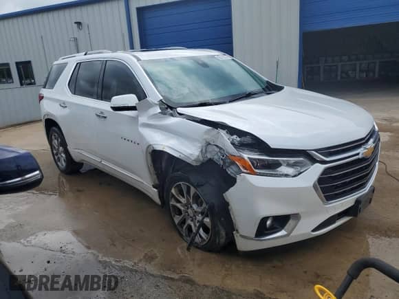 2018 Chevrolet Traverse Premier z VIN 1GNERKKW8JJ104361, wystawiony jako Copart lot #71651405 z przebiegiem 154 557 mil mil oraz Czysty tytuł • Clean title. Historia ofert i sprzedaży dostępna na DreamBid. Obrazek 4.