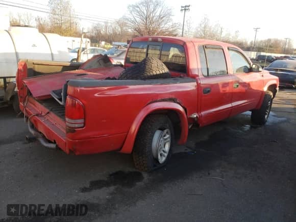 2002 Dodge Dakota Sport с VIN 1B7HG38NX2S515384, выставлен на аукционе Copart как лот 80640954 с пробегом 247 495 миль миль и Списание • Salvage title. История ставок и продаж доступна на DreamBid. Изображение 3.