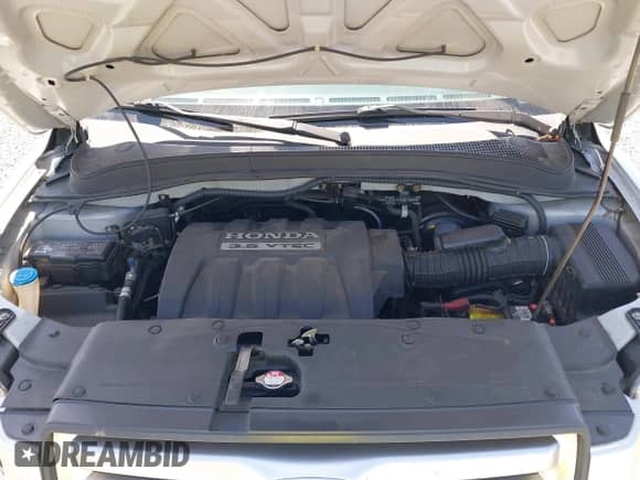 2006 Honda Pilot EX-L z VIN 2HKYF18606H511736, wystawiony jako IAAI lot #42731682 z przebiegiem 142 934 mil mil oraz . Historia ofert i sprzedaży dostępna na DreamBid. Obrazek 10.