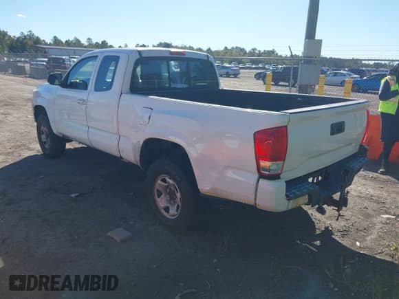 2016 Toyota Tacoma SR with VIN 5TFRX5GN4GX058969, listed as a IAAI auction lot 43590771 with 237,437 mi miles and . Bid and sale history available at DreamBid. Image 3.