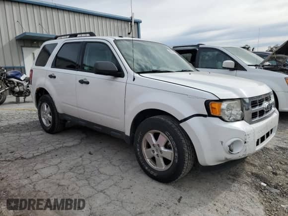 2011 Ford Escape XLT с VIN 1FMCU9D73BKB74256, выставлен на аукционе Copart как лот 85528595 с пробегом 222 570 миль миль и Списание • Salvage title. История ставок и продаж доступна на DreamBid. Изображение 4.