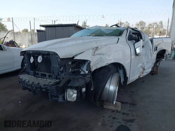 2014 Ram 1500 Express z VIN 3C6JR6AT4EG285012, wystawiony jako IAAI lot #42867183 z przebiegiem Nie podano mil oraz . Historia ofert i sprzedaży dostępna na DreamBid. Obrazek 2.