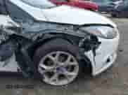 2014 Ford Focus Titanium with VIN 1FADP3J27EL215076, listed as a IAAI auction lot 43442107 with 137,959 mi miles and . Bid and sale history available at DreamBid. Image 18.