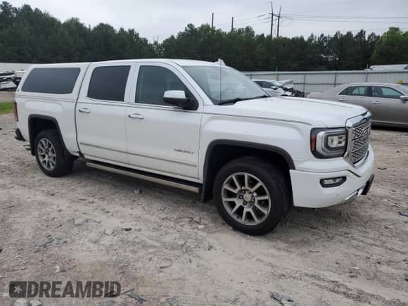 2017 GMC Sierra 1500 Denali with VIN 3GTP1PEC1HG231343, listed as a Copart auction lot 62217985 with 228,386 mi miles and Clean title. Bid and sale history available at DreamBid. Image 4.