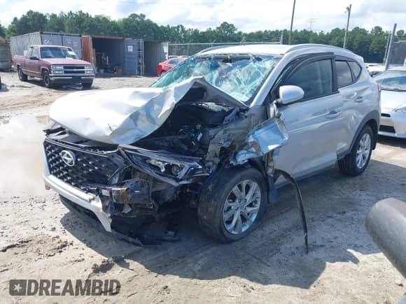 2021 Hyundai Tucson Value with VIN KM8J33A41MU390079, listed as a IAAI auction lot 42925437 with 57,857 mi miles and . Bid and sale history available at DreamBid. Image 2.