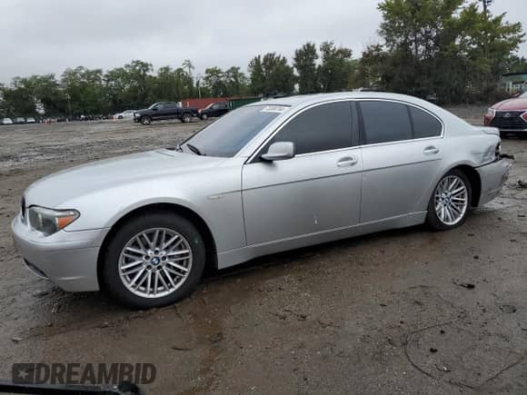 2004 BMW 7 Series 745i with VIN WBAGL634X4DP70421, listed as a Copart auction lot 73309744 with 123,457 mi miles and Salvage title. Bid and sale history available at DreamBid. Image 1.
