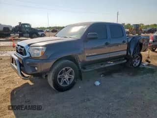 2013 Toyota Tacoma PreRunner with VIN 5TFKU4HN0DX003238, listed as a Copart auction lot 71698585 with 112,121 mi miles and Salvage title. Bid and sale history available at DreamBid. Image 1.