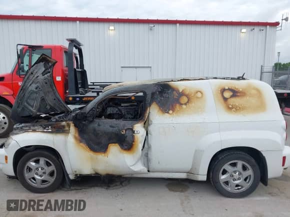 2009 Chevrolet HHR LS with VIN 3GCCA85B79S606453, listed as a IAAI auction lot 42624404 with Not provided miles and . Bid and sale history available at DreamBid. Image 14.