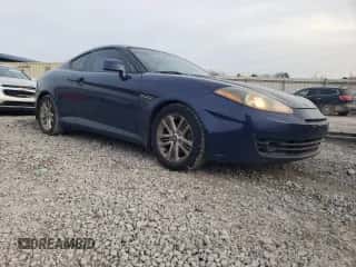 2007 Hyundai Tiburon GS с VIN KMHHM66D97U260559, выставлен на аукционе Copart как лот 43320165 с пробегом 181 148 миль миль и Списание • Salvage title. История ставок и продаж доступна на DreamBid. Изображение 4.