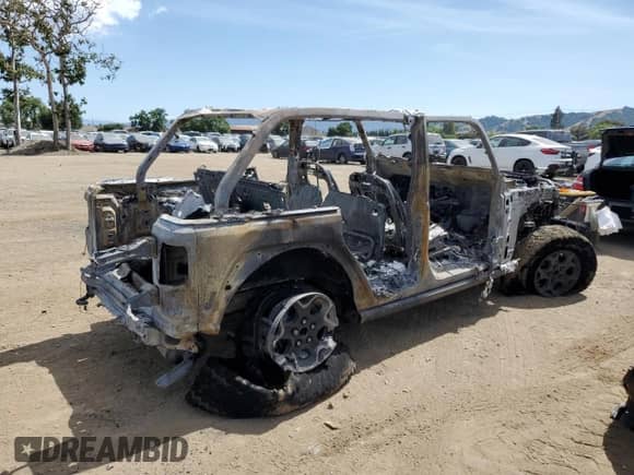 2022 Jeep Wrangler Unlimited Rubicon с VIN 1C4JJXR64NW223339, выставлен на аукционе Copart как лот 56760735 с пробегом Не указан миль и На запчасти • Non repairable. История ставок и продаж доступна на DreamBid. Изображение 3.