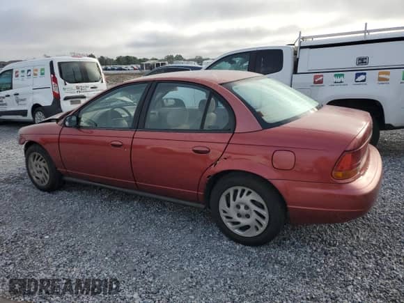 1998 Saturn SL with VIN 1G8ZK5271WZ179625, listed as a Copart auction lot 50878255 with 180,085 mi miles and Salvage title. Bid and sale history available at DreamBid. Image 2.