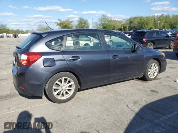 2014 Subaru Impreza Premium with VIN JF1GPAC67E8287593, listed as a Copart auction lot 82109635 with 73,638 mi miles and Salvage title. Bid and sale history available at DreamBid. Image 3.