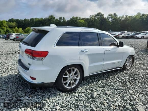 2014 Jeep Grand Cherokee Summit with VIN 1C4RJFJT3EC154515, listed as a Copart auction lot 65004515 with 149,979 mi miles and Salvage title. Bid and sale history available at DreamBid. Image 3.