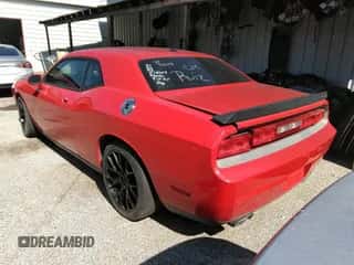 2010 Dodge Challenger SRT-8 with VIN 2B3CJ7DW4AH238109, listed as a IAAI auction lot 43482689 with 130,832 mi miles and . Bid and sale history available at DreamBid. Image 3.