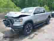 2020 Ram 1500 Rebel with VIN 1C6SRFLT8LN229872, listed as a IAAI auction lot 42135383 with 71,741 mi miles and . Bid and sale history available at DreamBid. Image 2.