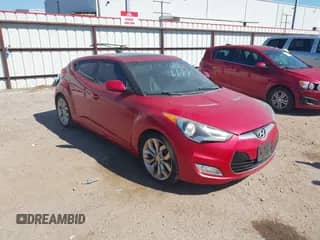 2012 Hyundai Veloster w/Gray Int z VIN KMHTC6AD1CU051606, wystawiony jako IAAI lot #43436964 z przebiegiem 144 149 mil mil oraz . Historia ofert i sprzedaży dostępna na DreamBid. Obrazek 1.