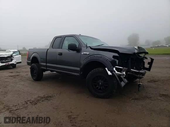 2015 Ford F-150 XLT z VIN 1FTEX1E82FFC63635, wystawiony jako Copart lot #83764015 z przebiegiem 111 674 mil mil oraz Szkoda całkowita • Salvage title. Historia ofert i sprzedaży dostępna na DreamBid. Obrazek 13.