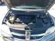 2009 Dodge Journey SE z VIN 3D4GG47BX9T220032, wystawiony jako IAAI lot #43115516 z przebiegiem 165 388 mil mil oraz . Historia ofert i sprzedaży dostępna na DreamBid. Obrazek 10.