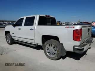 2017 Chevrolet Silverado 1500 High Country z VIN 3GCUKTEJXHG216945, wystawiony jako Copart lot #85794395 z przebiegiem 129 032 mil mil oraz Szkoda całkowita • Salvage title. Historia ofert i sprzedaży dostępna na DreamBid. Obrazek 2.