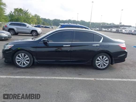 2017 Honda Accord Touring with VIN 1HGCR3F96HA026801, listed as a IAAI auction lot 42938315 with 71,156 mi miles and . Bid and sale history available at DreamBid. Image 15.