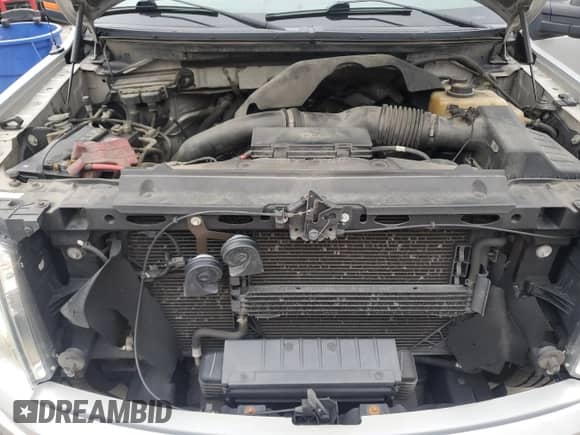 2012 Ford F-150 XL z VIN 1FTFX1CT4CFC92318, wystawiony jako Copart lot #61230155 z przebiegiem 194 595 mil mil oraz Szkoda całkowita • Salvage title. Historia ofert i sprzedaży dostępna na DreamBid. Obrazek 11.