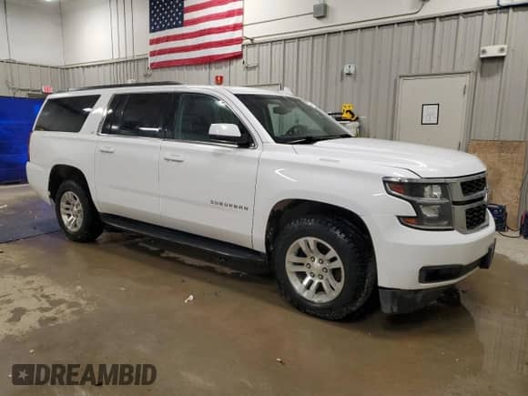 2020 Chevrolet Suburban LT z VIN 1GNSKHKC0LR268448, wystawiony jako Copart lot #71002325 z przebiegiem 190 317 mil mil oraz Czysty tytuł • Clean title. Historia ofert i sprzedaży dostępna na DreamBid. Obrazek 4.