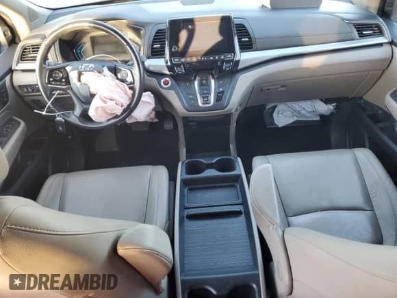 2019 Honda Odyssey EX-L with VIN 5FNRL6H78KB124671, listed as a Copart auction lot 84949865 with 104,835 mi miles and Salvage title. Bid and sale history available at DreamBid. Image 8.