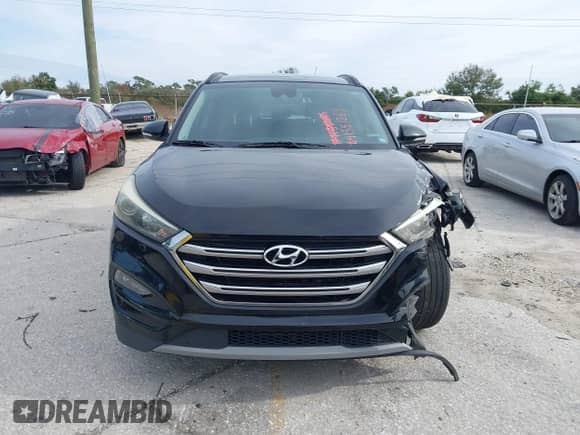 2018 Hyundai Tucson Value z VIN KM8J33A27JU619066, wystawiony jako IAAI lot #41351283 z przebiegiem 89 805 mil mil oraz . Historia ofert i sprzedaży dostępna na DreamBid. Obrazek 12.