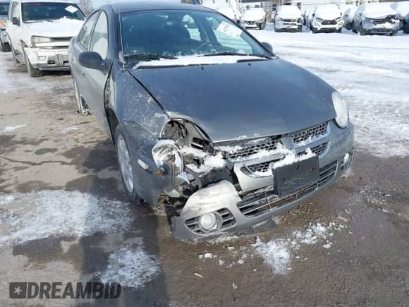 2005 Dodge Neon SXT z VIN 1B3ES56C75D217996, wystawiony jako IAAI lot #41379155 z przebiegiem 164 876 mil mil oraz . Historia ofert i sprzedaży dostępna na DreamBid. Obrazek 6.