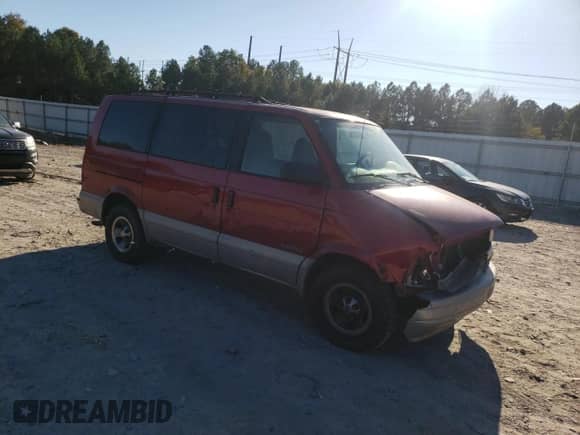 2000 Chevrolet Astro with VIN 1GNDM19W6YB180580, listed as a Copart auction lot 77676494 with 413,650 mi miles and Salvage title. Bid and sale history available at DreamBid. Image 4.