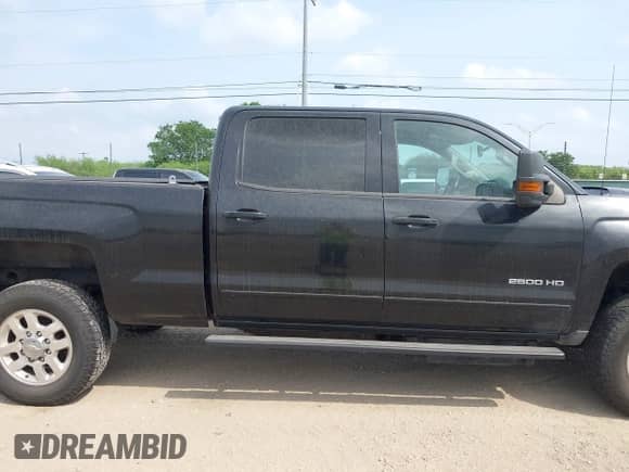 2015 Chevrolet Silverado 2500HD LT z VIN 1GC1KVE88FF599973, wystawiony jako IAAI lot #42159154 z przebiegiem 83 987 mil mil oraz . Historia ofert i sprzedaży dostępna na DreamBid. Obrazek 13.