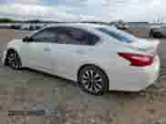 2016 Nissan Altima S with VIN 1N4AL3AP7GC285609, listed as a Copart auction lot 86488025 with 131,957 mi miles and Salvage title. Bid and sale history available at DreamBid. Image 2.