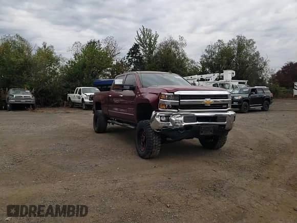 2015 Chevrolet Silverado 3500HD LTZ with VIN 1GC4K0C89FF558397, listed as a Copart auction lot 71624745 with 214,693 mi miles and Salvage title. Bid and sale history available at DreamBid. Image 13.