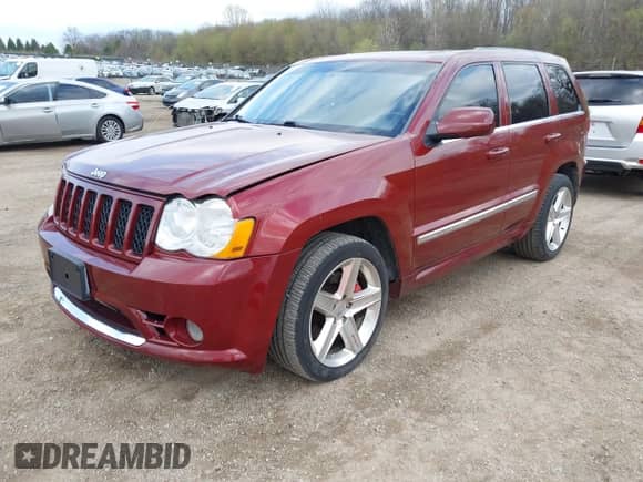 2009 Jeep Grand Cherokee with VIN 1J8HR78W69C500470, listed as a IAAI auction lot 42109809 with 87,761 mi miles and . Bid and sale history available at DreamBid. Image 17.