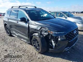 2022 Hyundai Santa Fe XRT with VIN 5NMS64AJ6NH396903, listed as a IAAI auction lot 41199768 with 60,874 mi miles and . Bid and sale history available at DreamBid. Image 1.